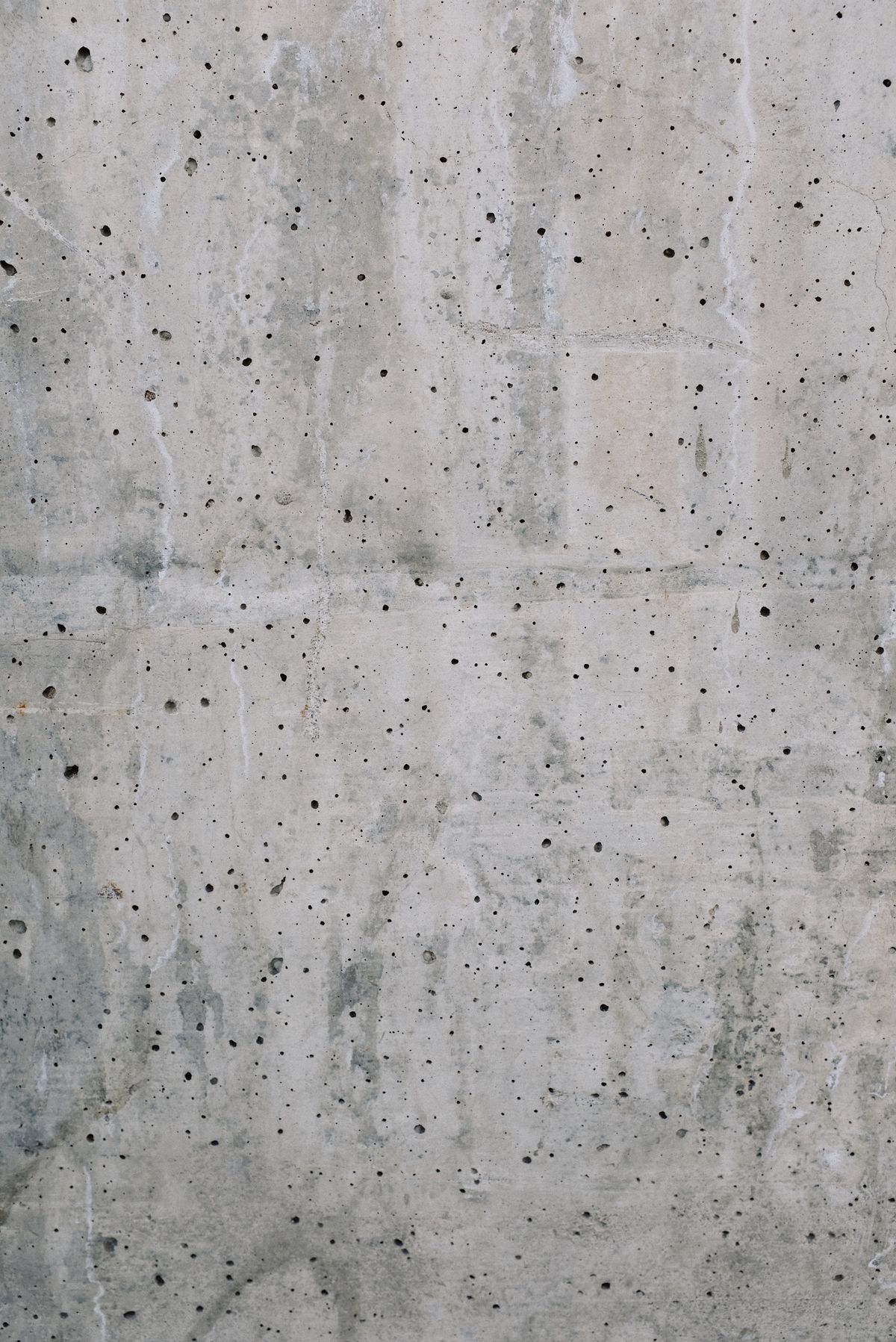 Textura de pared con acabado de cemento blanco